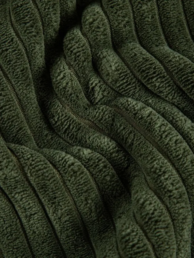 Koc MIRADO zielony o strukturze sztruksu z podbiciem boucle 150x200cm